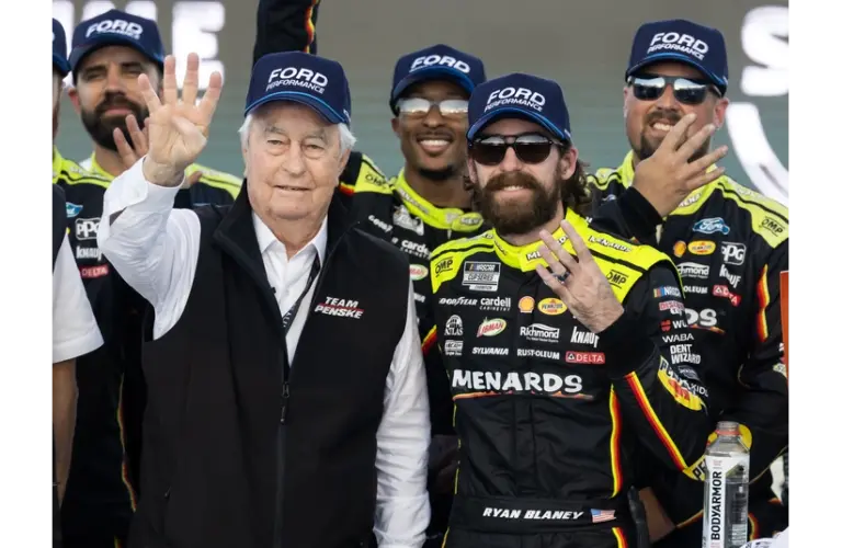 Nov 2, 2025; Avondale, Arizona, USA; NASCAR Cup Series driver Ryan Blaney (right) celebrates with team owner Roger Penske after winning the NASCAR Championship race at Phoenix Raceway. Ford Racing
