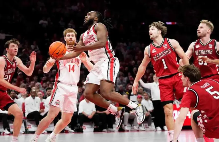 Ohio State Buckeyes guard Bruce Thornton (2) shoots past Nebraska Cornhuskers guard Sam Hoiberg (1) during the second half of the NCAA men's basketball game at the Schottenstein Center in Columbus on Jan. 5, 2026. Ohio State lost 72-69.