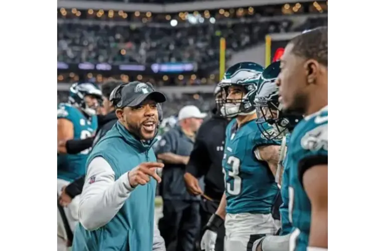 Cowboys requesting to Interview Christian Parker who is talking to the Eagles defense on the sideline