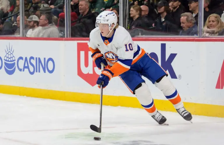 Jan 10, 2026; Saint Paul, Minnesota, USA; New York Islanders right wing Simon Holmstrom (10) skates with the puck against New York Islanders in the second period at Grand Casino Arena. Before the game in Winnipeg.