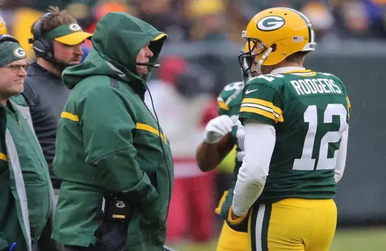 Green Bay Packers quarterback Aaron Rodgers (12) talks with Green Bay Packers' Mike McCarthy. Will they reunite with the Steelers?