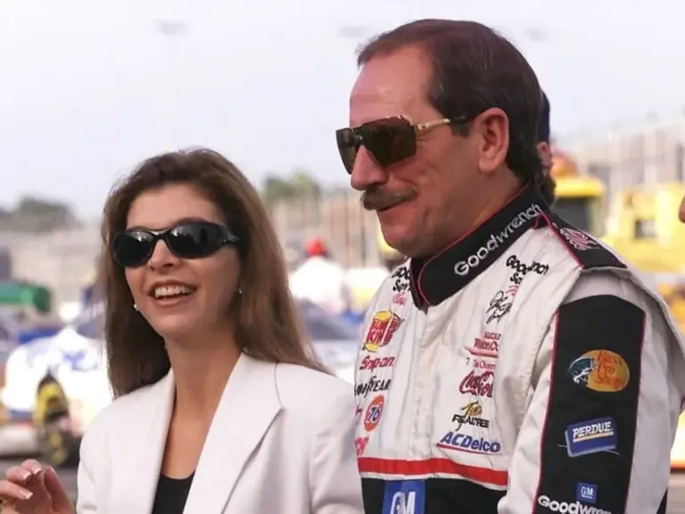 Dale Earnhardt with his team owner wife Theresa during the driver introductions before the start of the Pepsi 400 July 1999.