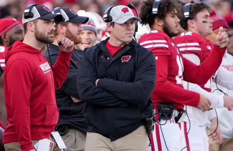Wisconsin head coach Jim Leonhard, center, is shown during the first quarter of their game Saturday, November 26, 2022 at Camp Randall Stadium in Madison