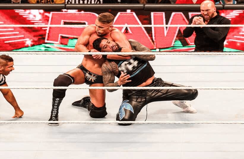 Hey Uso in a headlock on Raw.