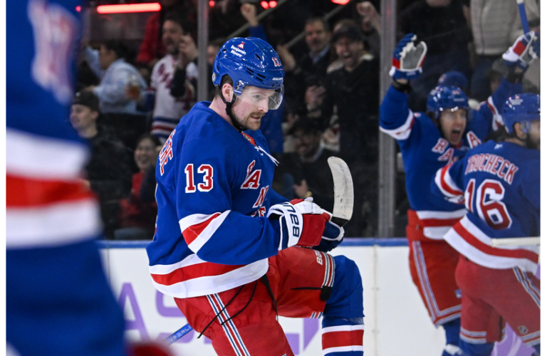 Rangers left wing Alexis Lafrenière celebrates his first goal against the Dallas Stars during the first period at Madison Square Garden.