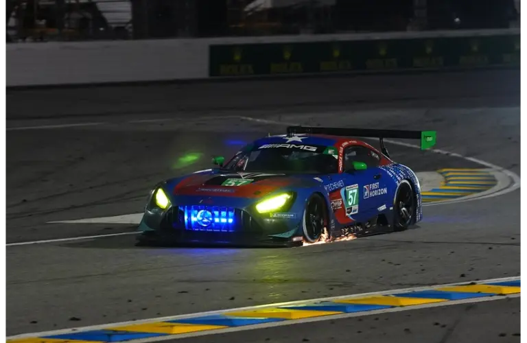 Jan 26, 2025; Daytona Beach, FL, USA; Winward Racing Mercedes AMG GT3 EVO of Russell Ward, Phillip Ellis, Indy Dontje, and Daniel Morad (57) races during the Rolex 24 at Daytona International Speedway.
