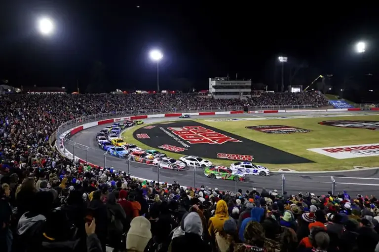 Feb 2, 2025; WInston-Salem, North Carolina, USA; NASCAR Cup Series driver Chase Elliot (9) and NASCAR Cup Series driver Chris Buescher (17) lead the field during the Clash at Bowman Gray at Bowman Gray Stadium.