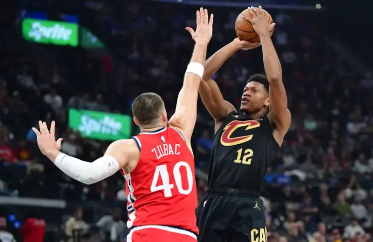 Cavaliers forward De’Andre Hunter (12) shoots against Clippers center Ivica Zubac (40).