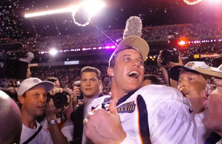 John Elway celebrates the Denver Broncos' Super Bowl win over the Atlanta Falcons in Miami on Jan. 31, 1999.
