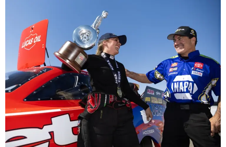 Apr 13, 2025; Las Vegas, NV, USA; NHRA top alcohol funny car driver Maddi Gordon celebrates with Ron Capps after winning the Four Wide Nationals at The Strip at Las Vegas Motor Speedway.
