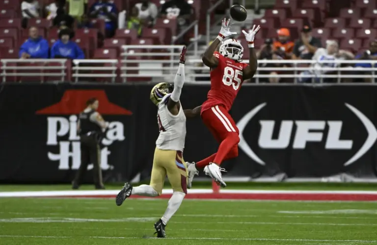 UFL player attempt to make a catch during last season.