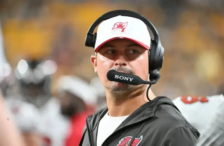 Tampa Bay Buccaneers offensive coordinator Josh Grizzard watches the action against the Pittsburgh Steelers during the second half at Acrisure Stadium