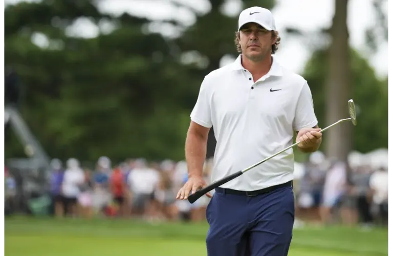 Aug 23, 2025; Detroit, Michigan, USA; Brooks Koepka of Smash GC lines up a putt on the 17th green during the semifinals of the LIV Golf Michigan Team Championship at The Cardinal at Saint John's Resort.