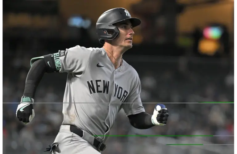 Yankees outfielder Cody Bellinger rounds the bases after hitting a two-run home run against the Minnesota Twins during the ninth inning at Target Field.