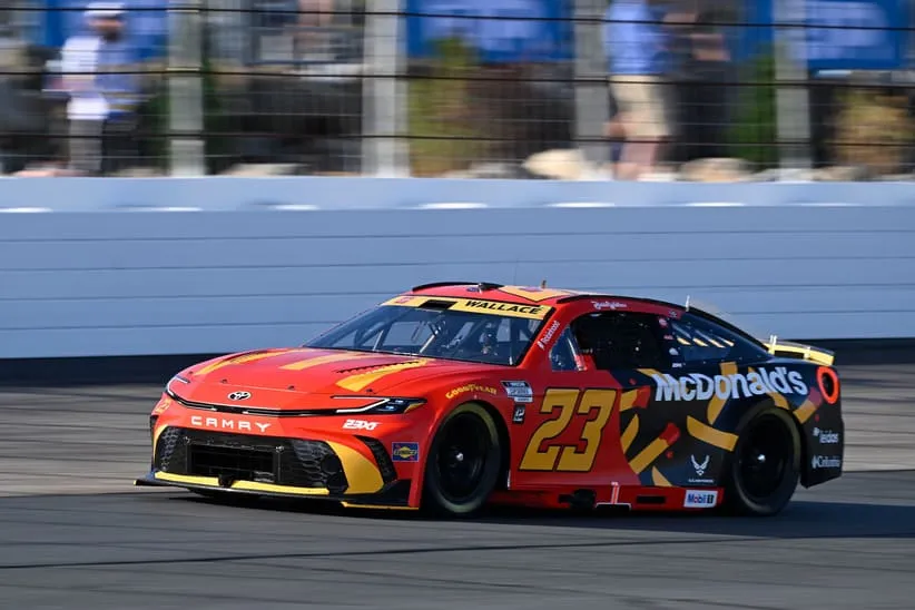 Sep 20, 2025; Loudon, New Hampshire, USA; NASCAR Cup Series driver Bubba Wallace (23) drives in the qualifying round of the Mobil 1 301 at New Hampshire Motor Speedway.