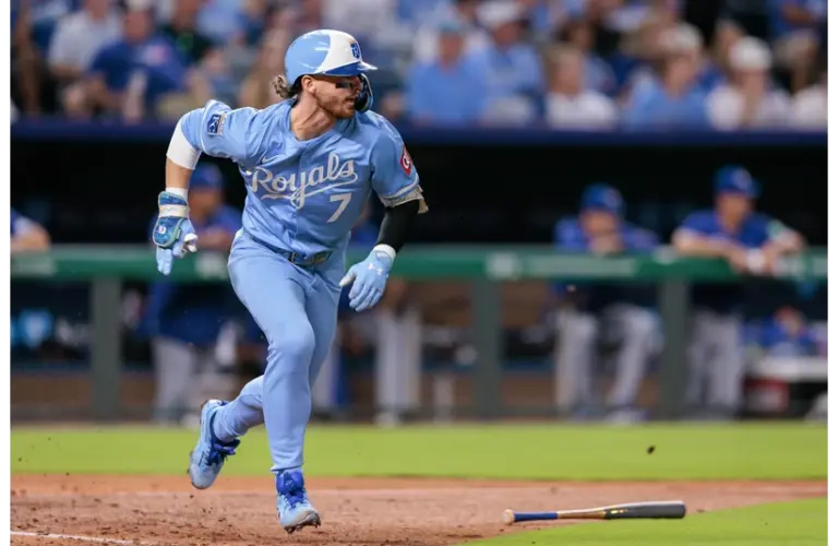 Royals shortstop Bobby Whitt Jr. Running to first base