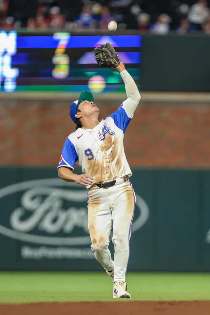 Atlanta Braves shortstop Ha-Seong Kim catching a pop-up.