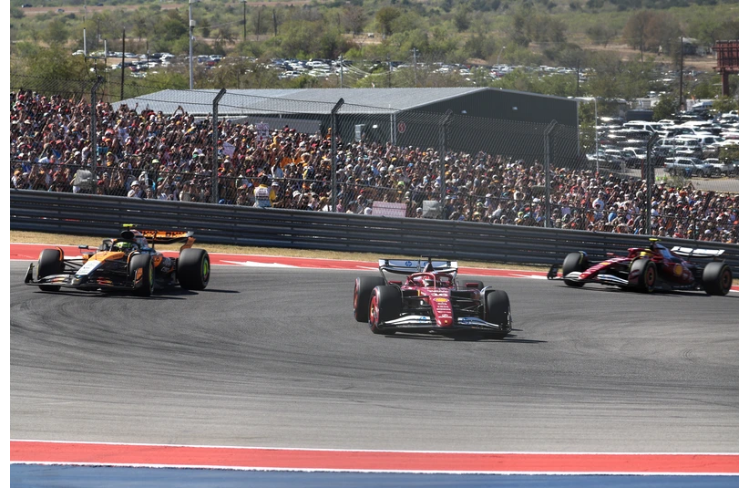 Oct 19, 2025; Austin, TX, USA; McLaren Renault Team driver Lando Norris (4) of Team Great Britain , second place and Scuderia Ferrari HP driver Charles Leclerc (16) of Team Monaco, third place and Scuderia Ferrari HP driver Lewis Hamilton (44) of Team Great Britain take torn one at Circuit of The Americas Austin.