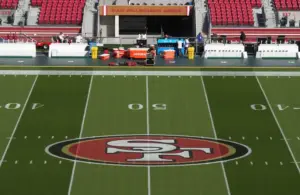The San Francisco 49ers logo is painted on the field before the game against the Atlanta Falcons at Levi's Stadium. Aldon Smith