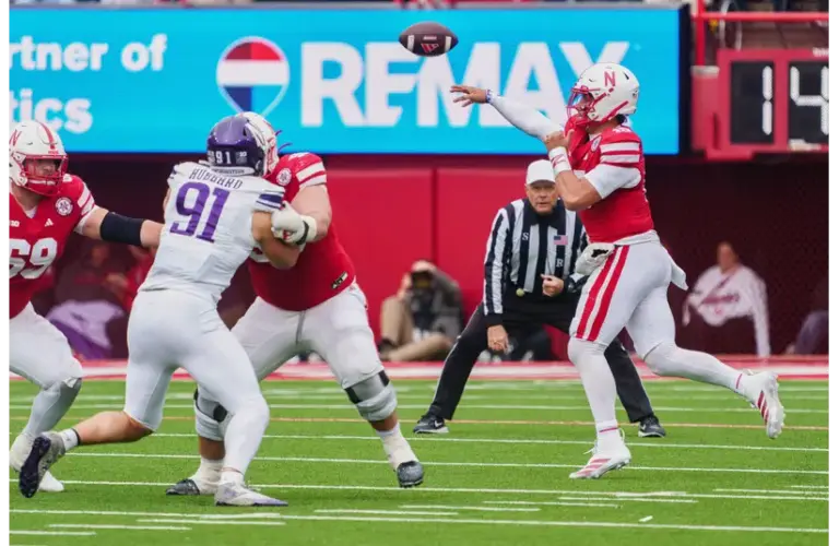 Oct 25, 2025; Lincoln, Nebraska, USA; Nebraska Cornhuskers quarterback Dylan Raiola (15) throws a pass against Northwestern Wildcats defensive lineman Aidan Hubbard (91) during the fourth quarter at Memorial Stadium. Transferring to the Oregon Ducks.