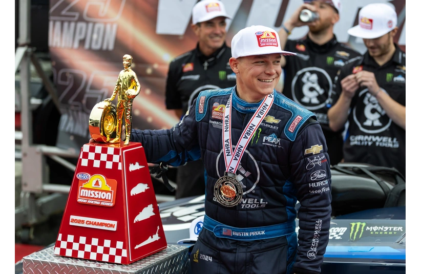 Nov 16, 2025; Pomona, CA, USA; NHRA funny car driver Austin Prock celebrates after clinching the 2025 NHRA world championship following the NHRA Finals at In-N-Out Burger Pomona Dragstrip. The event would be cancelled due to weather.