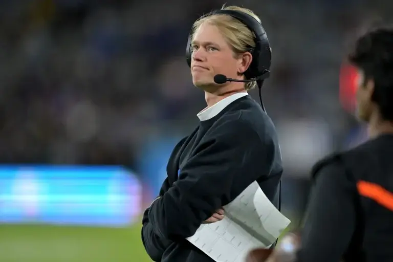 Jerry Neuheisel hired,