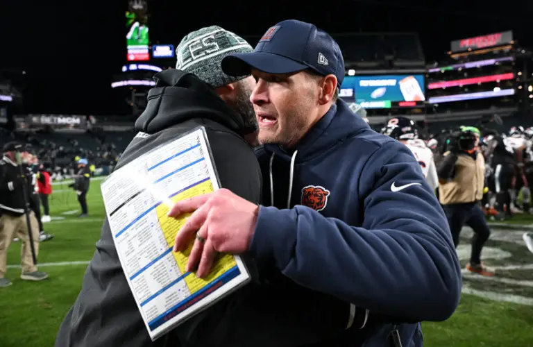 Chicago Bears Ben Johnson metting for post game handshake.