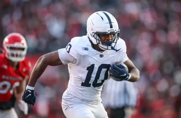 Penn State Nittany Lions running back Nicholas Singleton (10) carries the ball against the Rutgers Scarlet Knights during the first half at SHI Stadium.