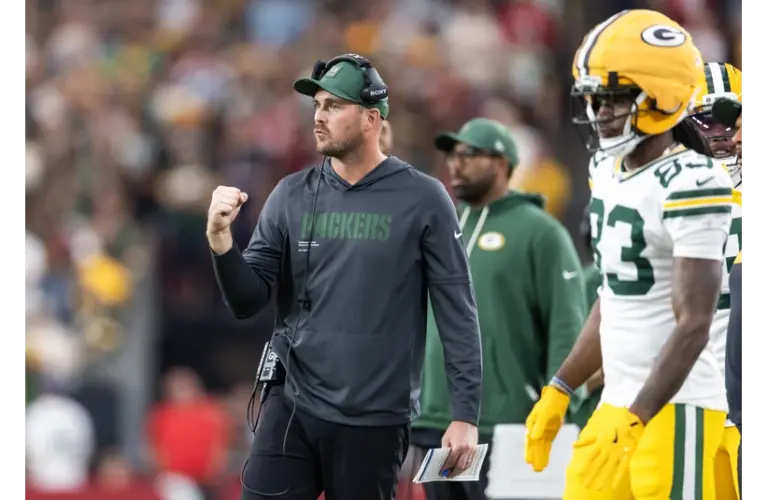 Newly Hired Eagles OC Sean Mannion celebrating on the sideline vs Arizona earlier this season.