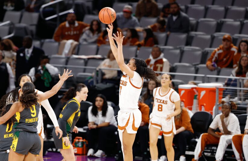 Texas Lady Longhorn puts up a shot.
