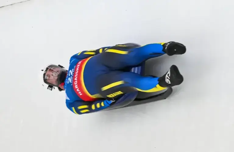 Anton Dukach (UKR) races during his first run in the Men’s Singles Luge at Mt Van Hoevenberg.