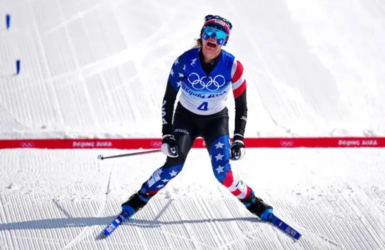 Jessie Diggins (USA) celebrates winning the silver medal in the women's cross-country skiing 30km freestyle during the Beijing 2022 Olympic Winter Games