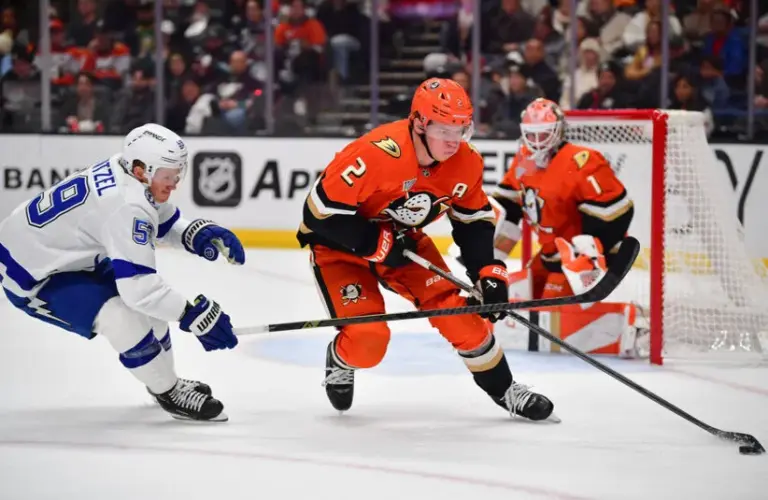 Anaheim Ducks defenseman Jackson LaCombe (2) moves the puck against Tampa Bay Lightning