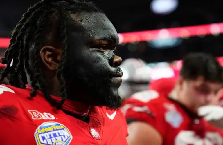 Ohio State Buckeyes defensive tackle Kayden McDonald (98) leaves the field following warm-ups prior to the Cotton Bowl at AT&T Stadium in Arlington, Texas for the College Football Playoff quarterfinal game against the Miami Hurricanes on Dec. 31, 2025.