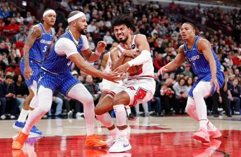 Jalen Suggs trying to get a steal vs Bulls