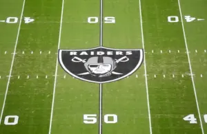 The Las Vegas Raiders shield logo at midfield at Allegiant Stadium, Henry Ruggs