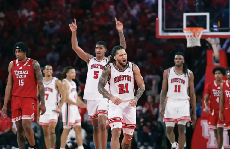 Houston player celebrates on court.