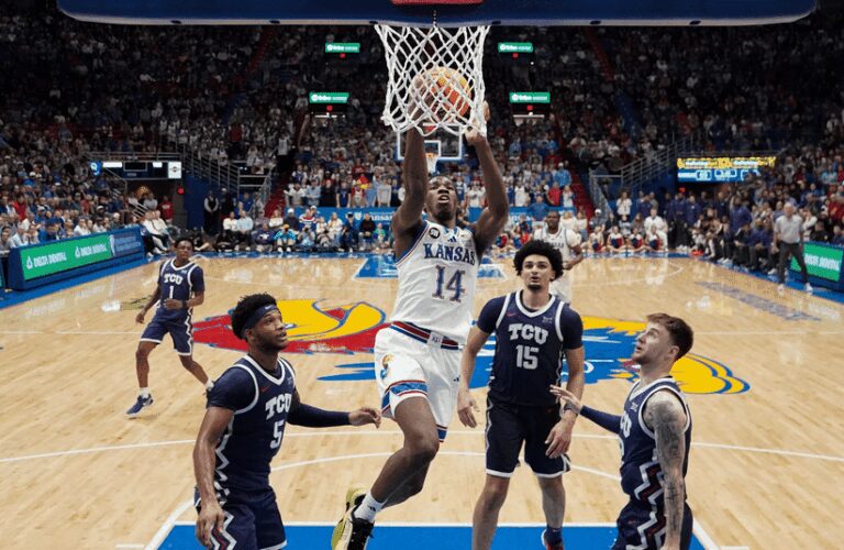 Kansas player scores basket on TCU.