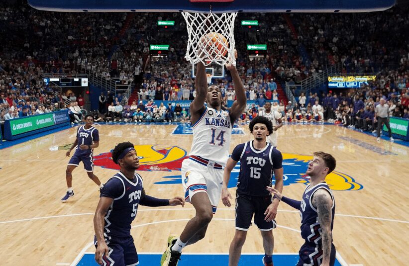 Kansas player scores basket on TCU.