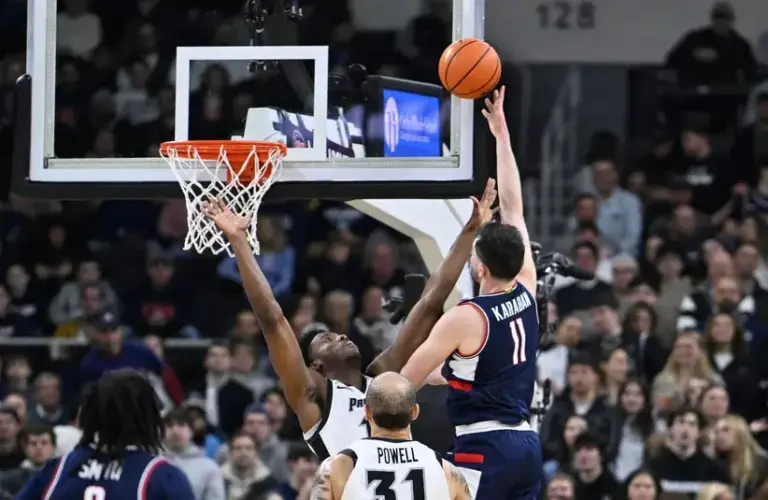 UConn Huskies forward Alex Karaban (11) shoots a lay up against Providence Friars forward Cole Hargrove (13) during the first half