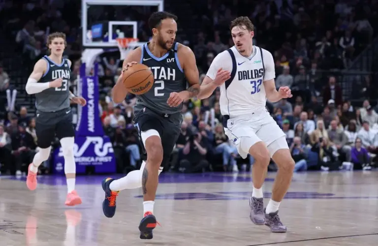 Utah Jazz forward Kyle Anderson (2) brings the ball up the court against Dallas Mavericks forward Cooper Flagg (32)