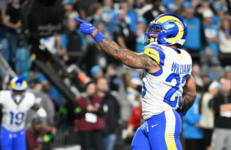 Los Angeles Rams running back Kyren Williams (23) celebrates a second-half touchdown against the Carolina Panthers in the NFC Wild Card game.