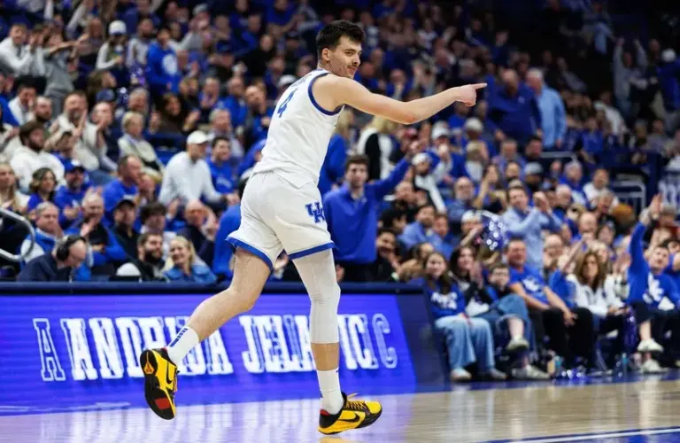 Kentucky Wildcats forward Andrija Jelavic (4) celebrates after making a three-point basket during the second half against the Mississippi State Bulldogs at Rupp Arena at Central Bank Center