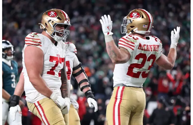 49ers running back Christian McCaffery Celebrates game winning Touchdown vs Eagles