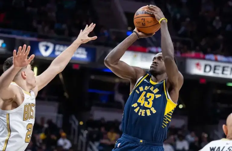 Indiana Pacers forward Pascal Siakam (43) shoots the ball while Boston Celtics guard Hugo Gonzalez (28) defends in the first half