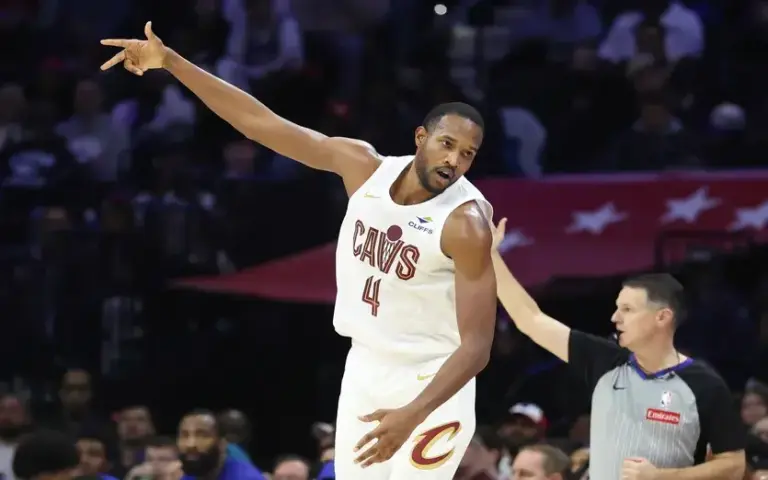 Cleveland Cavaliers power forward Evan Mobley (4) reacts to his three pointer against the Philadelphia 76ers during the second quarter