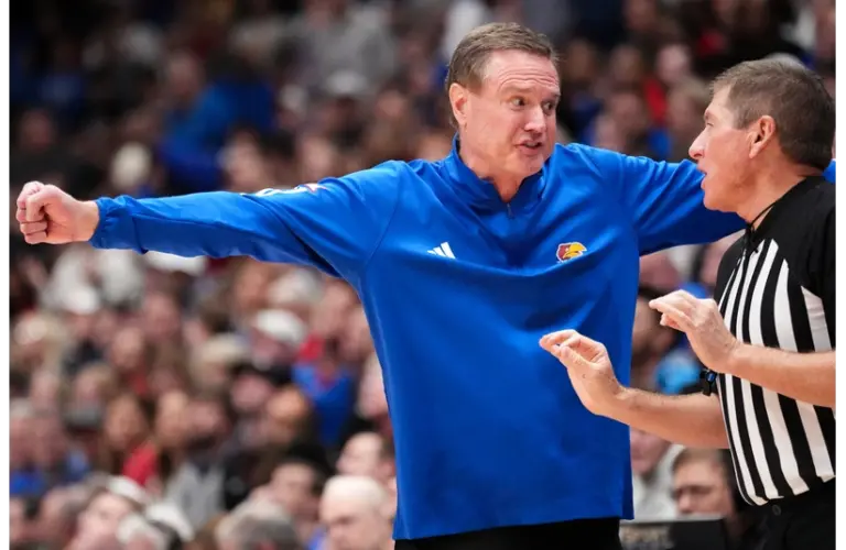 Bill Self discussing a call with a referee, Kansas Jayhawks