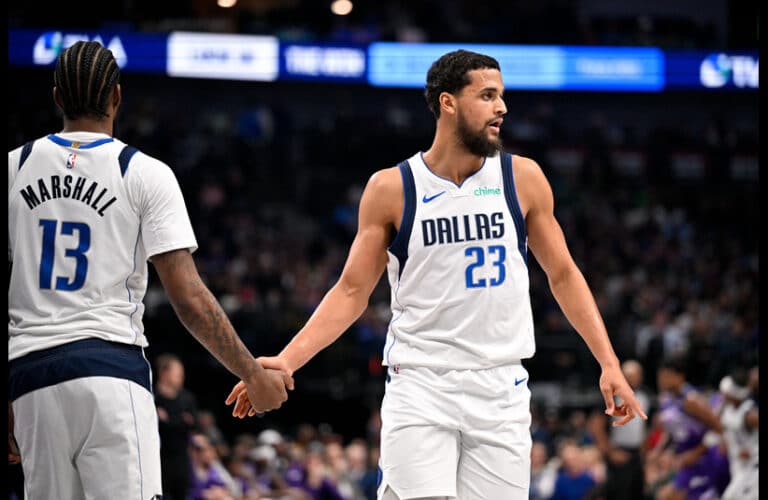 Mavericks Naji Marshall and Jeremiah Robinson-Earl Celebrating.