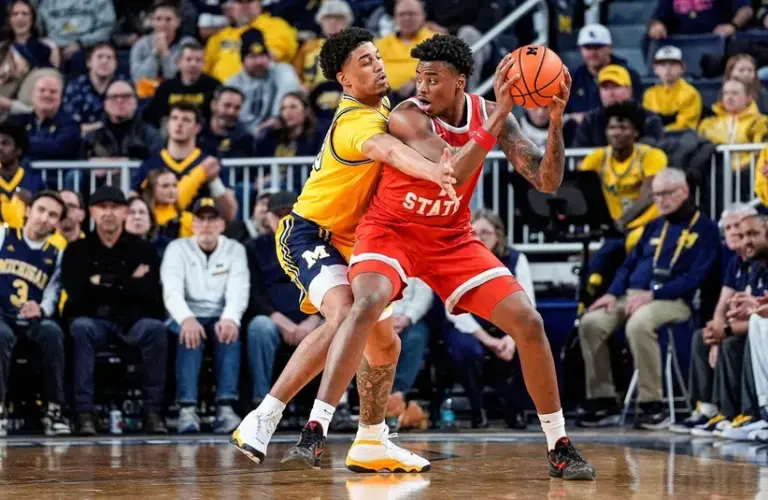 Michigan forward Yaxel Lendeborg (23) defends Ohio State forward Amare Bynum (1) during the first half at Crisler Center in Ann Arbor on Friday, Jan. 23, 2026