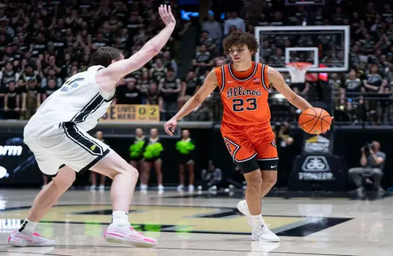 Illinois Fighting Illini guard Keaton Wagler (23) dribbles the ball during the first half against the Purdue Boilermakers.